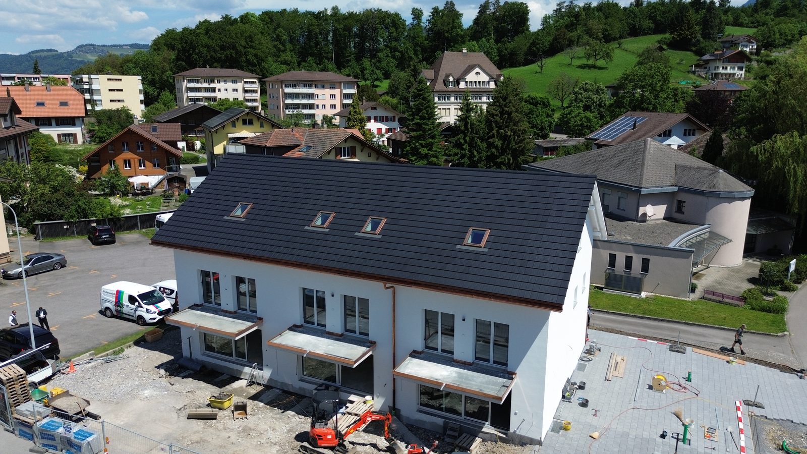 Neubau drei Einfamilienhäuser in Spiez